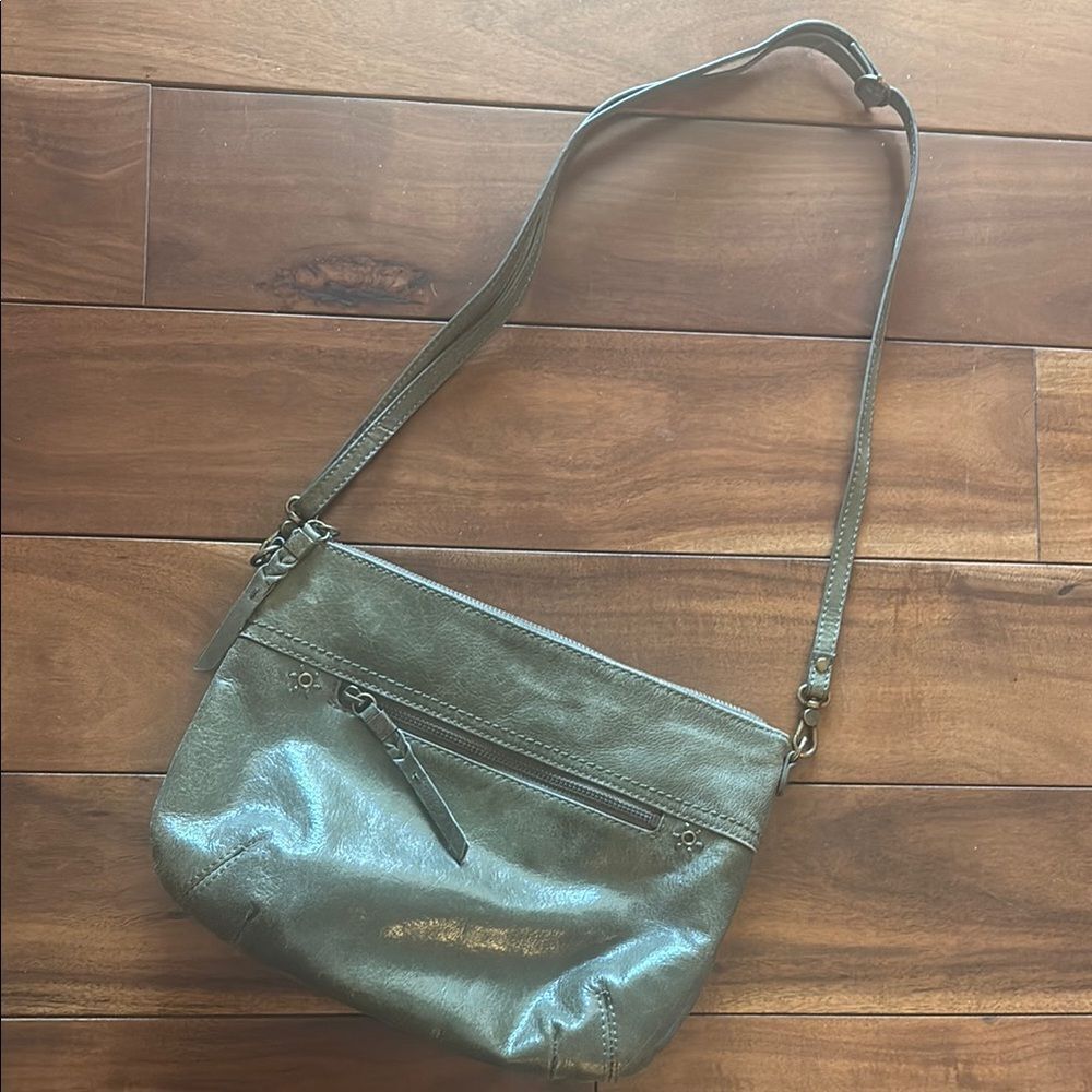 The Sak Olive Green Leather Crossbody Bag.